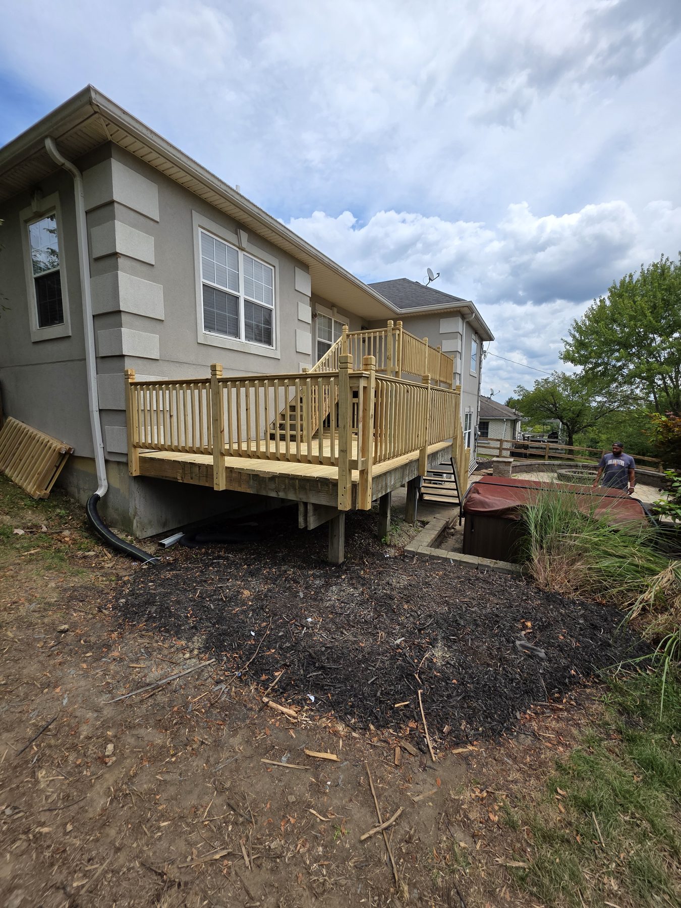 Completed multilevel deck after K4 replaced the decking, railings, and stairs