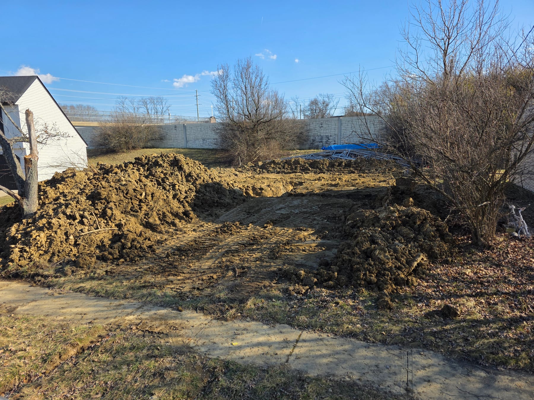 Footer excavation after K4 cleared the lot and re-established the house layout