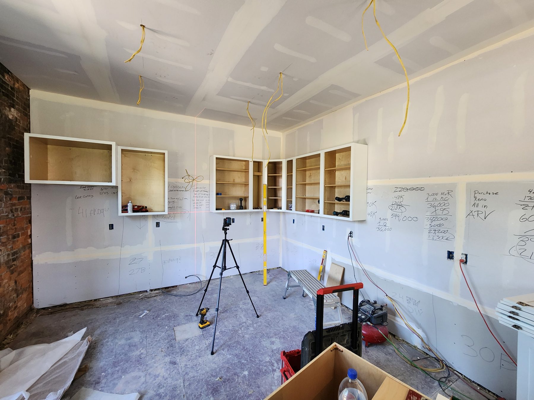 Laser reference lines used to establish the kitchen cabinet layout