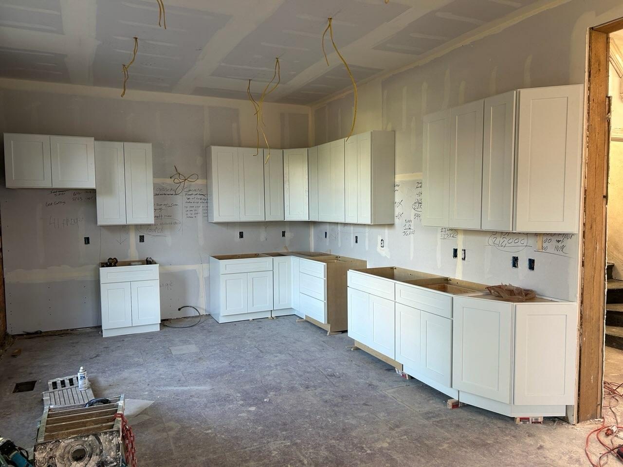 White shaker cabinets installed by K4 during a residential property flip