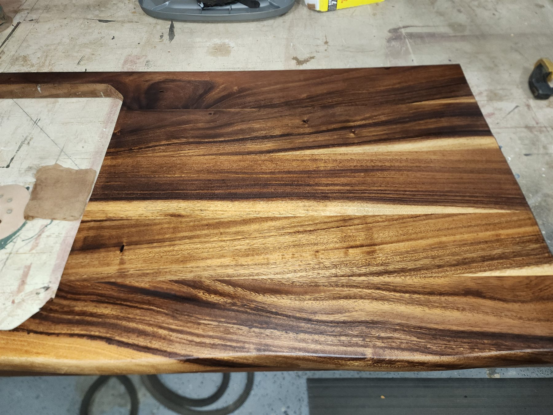 Close view of the restored natural live edge and finished wood grain