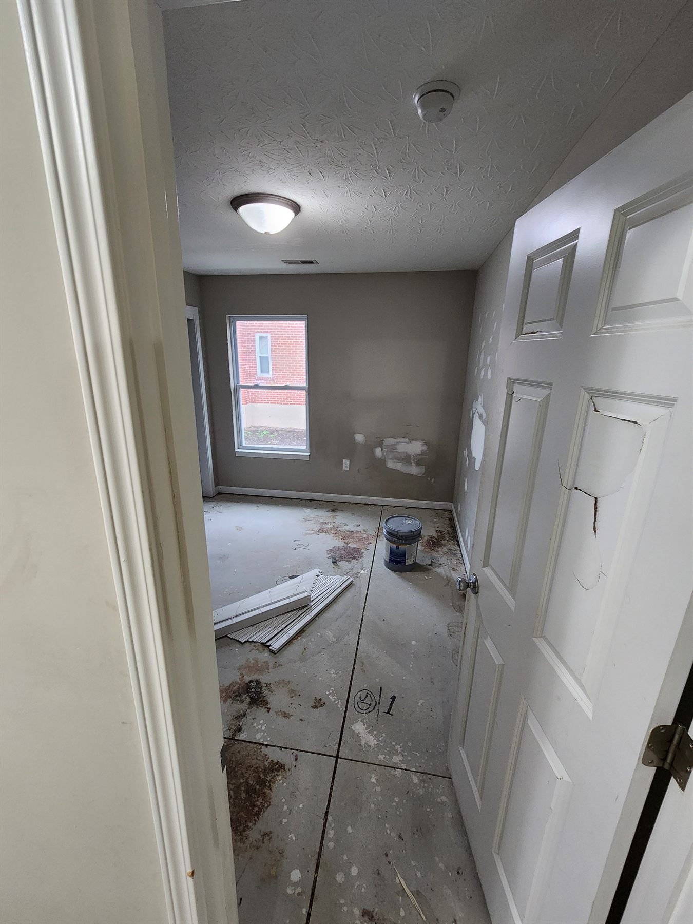 Bedroom cleared for wall and floor repairs