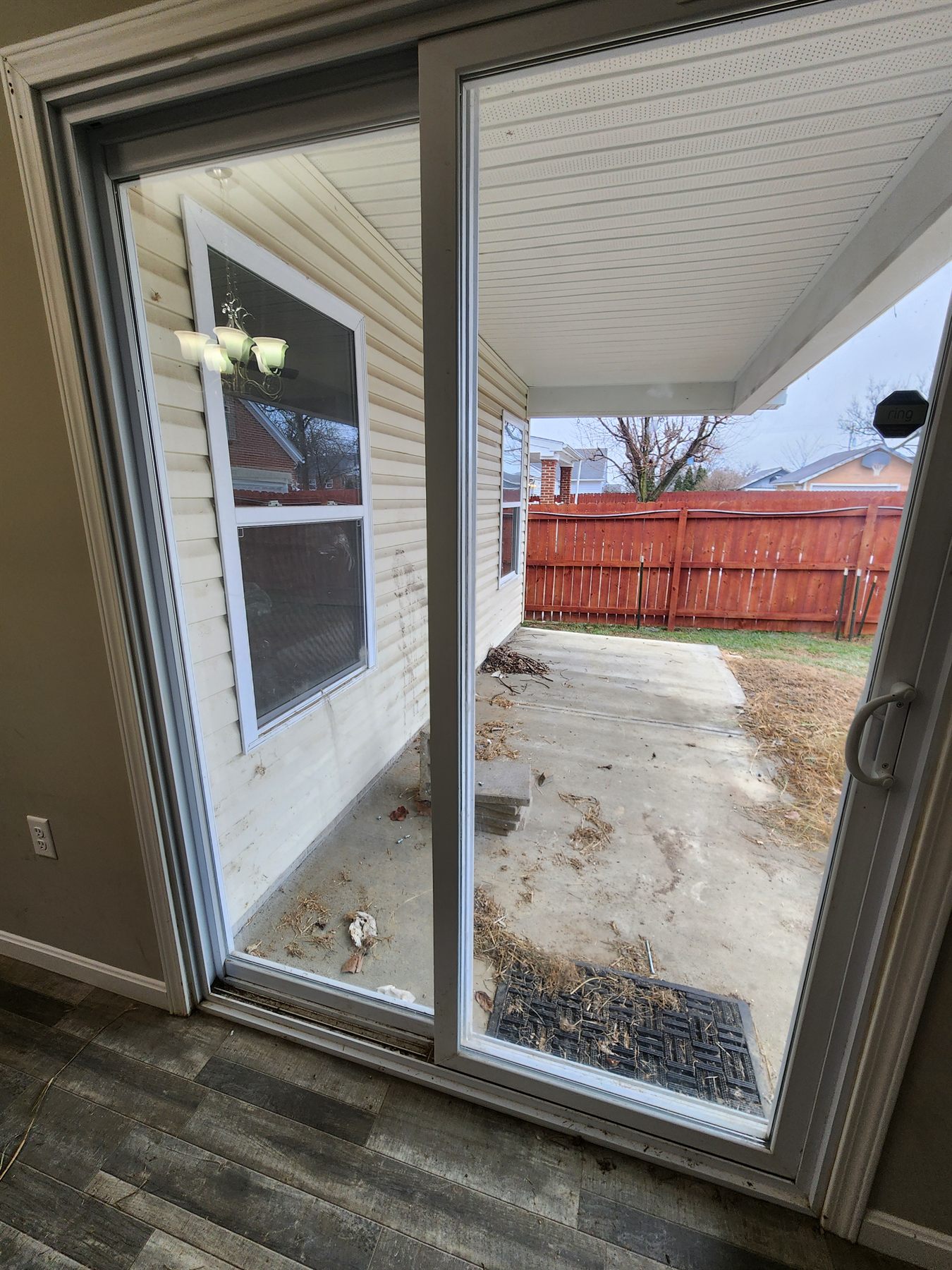 Rear patio and yard during property cleanup