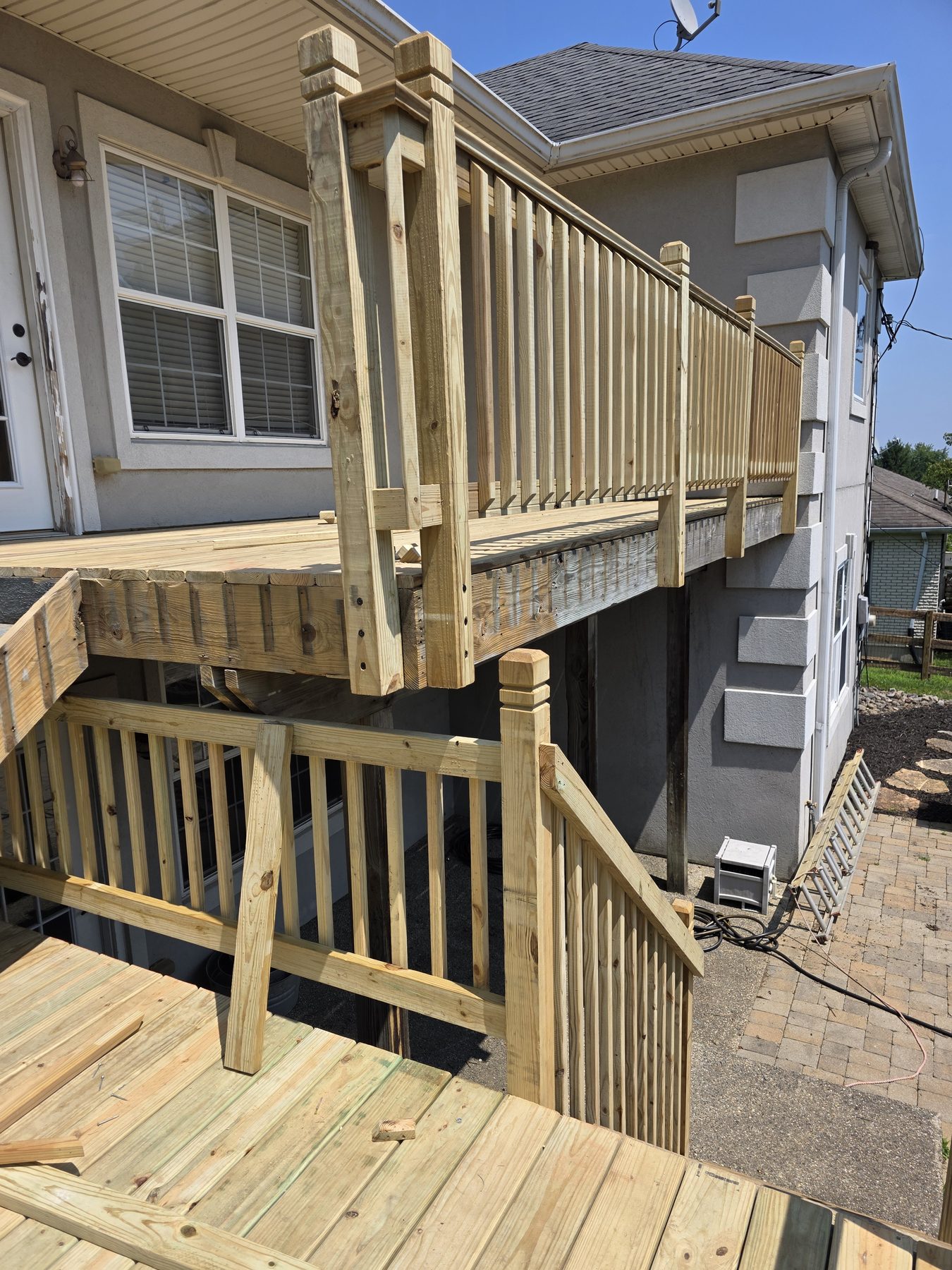 Upper deck railing installation from the landing