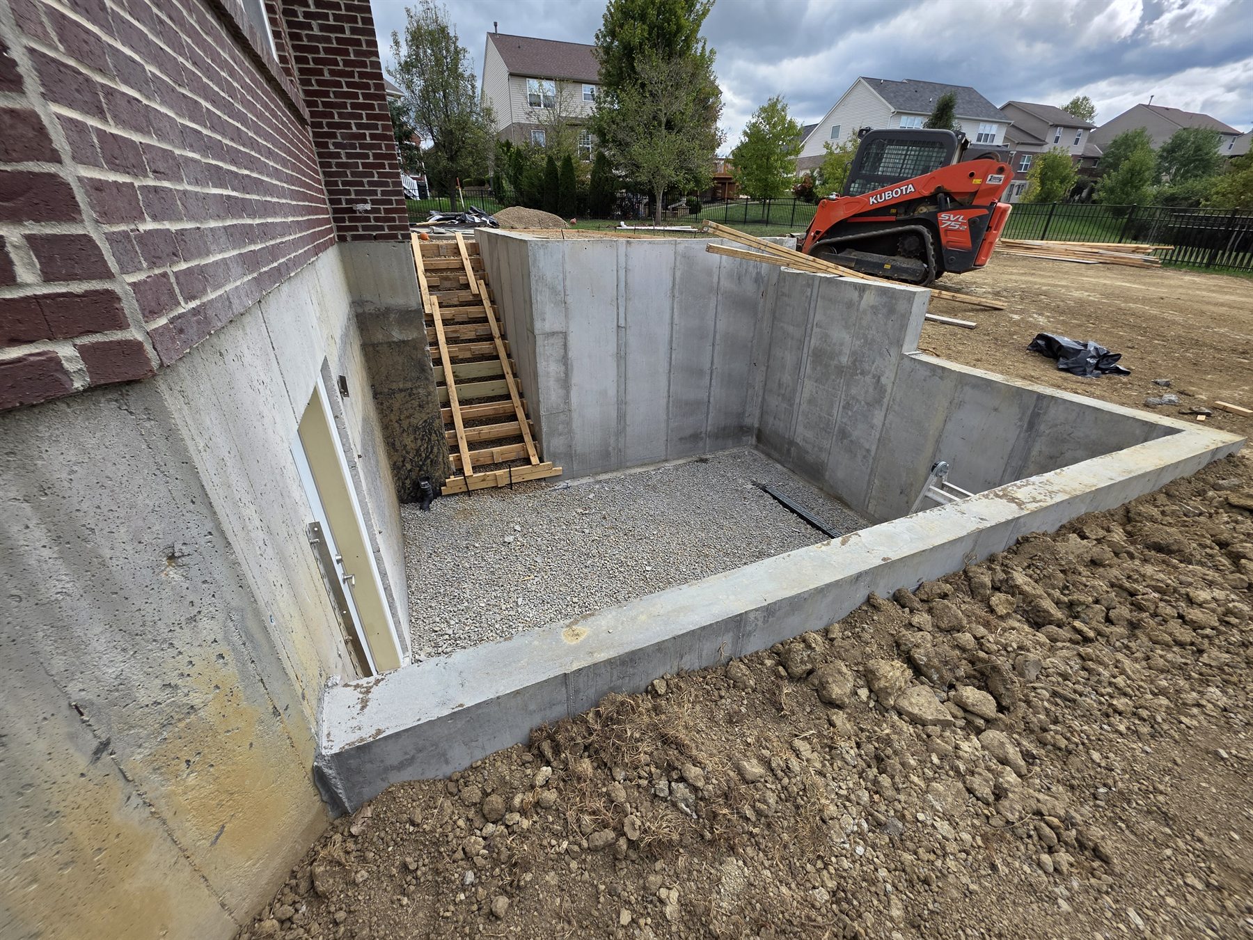 K4 basement walkout construction photo 25 of 33